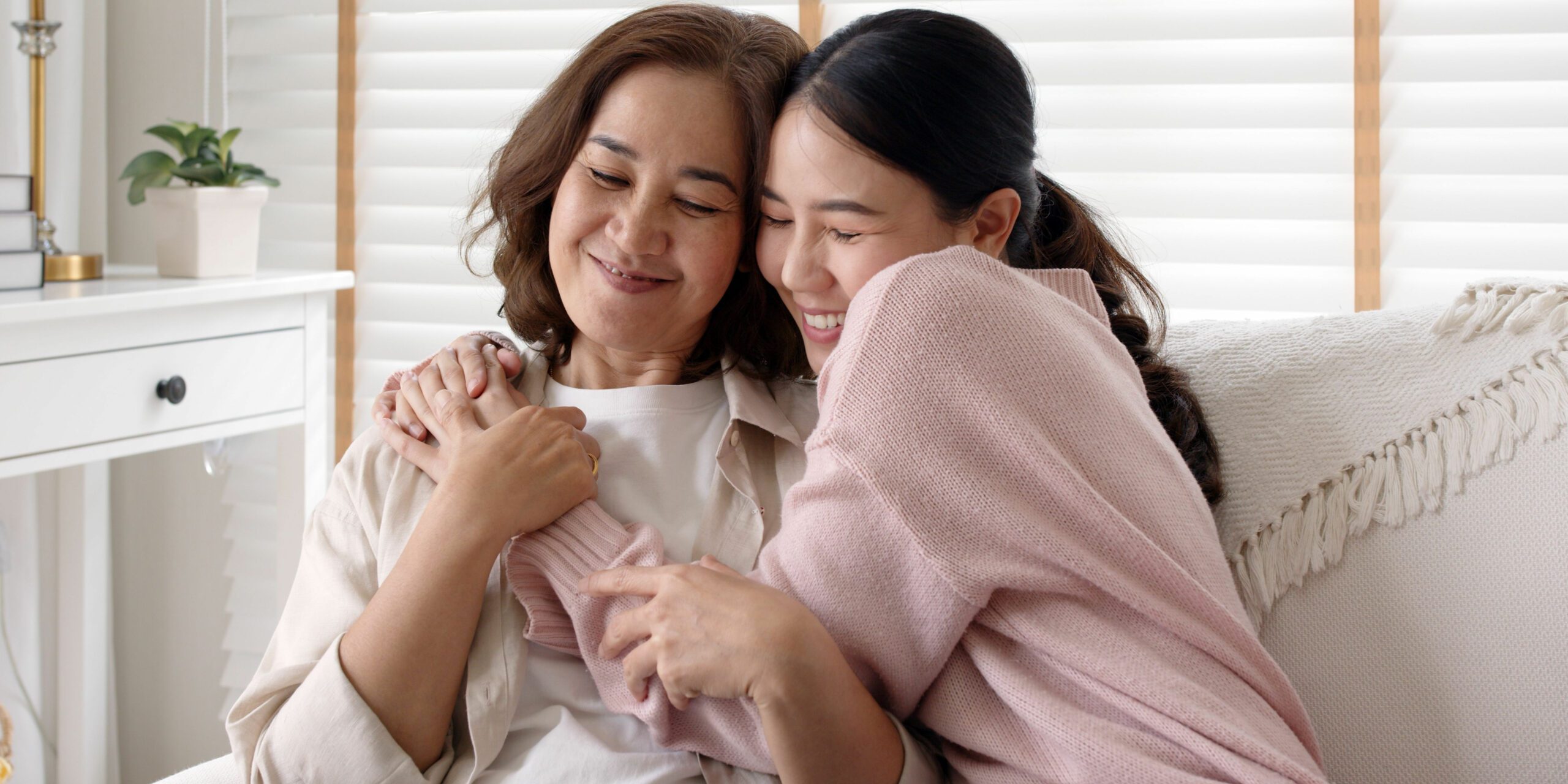 Happy thankful mother and daughter