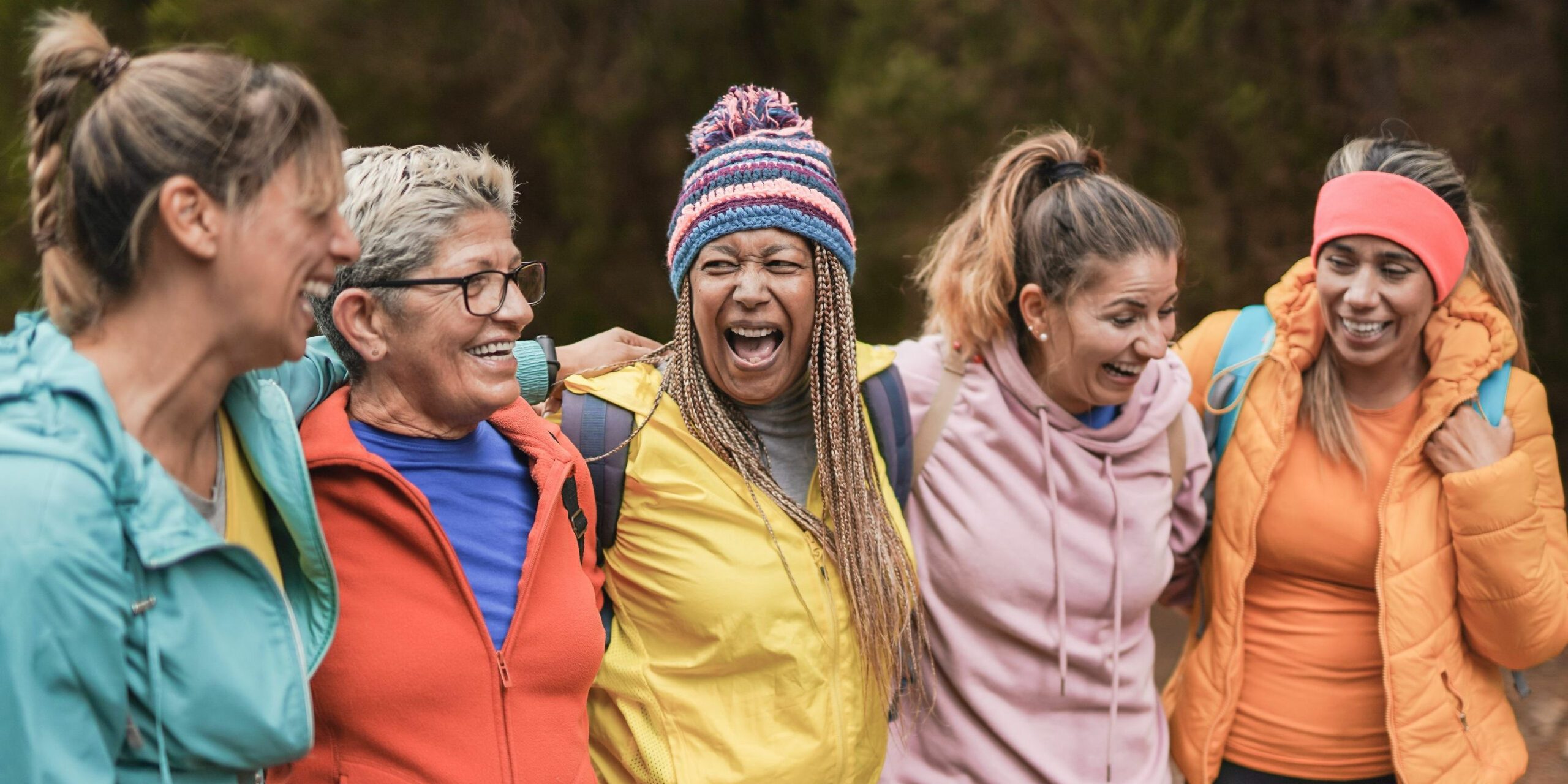 Group of happy women hikers of all ages feel better with optimum NAD+ levels