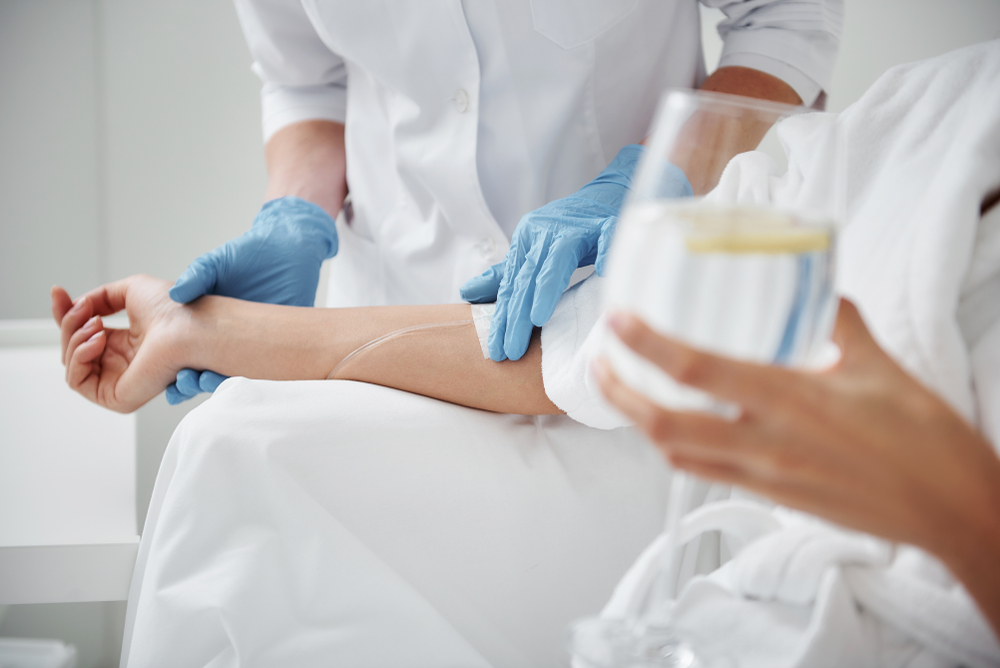 Woman getting relaxing and healing therapy IV